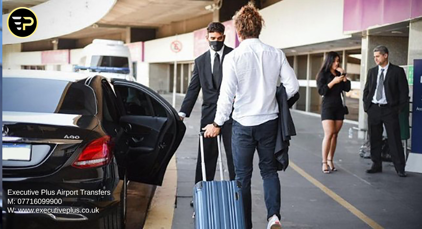 A group of people receiving transportation services of Executive Plus Airport Transfers at an airport.